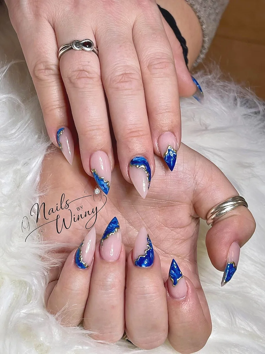 Blue marble gold stiletto nails at Maiden Nails Webster NY